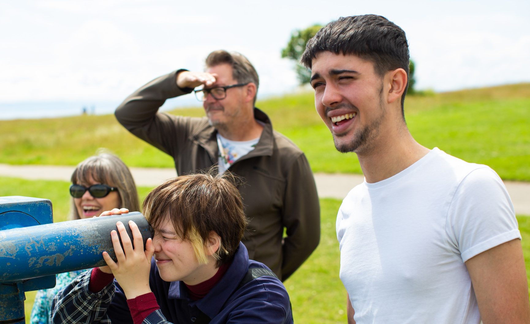 A family looking out into a distance
